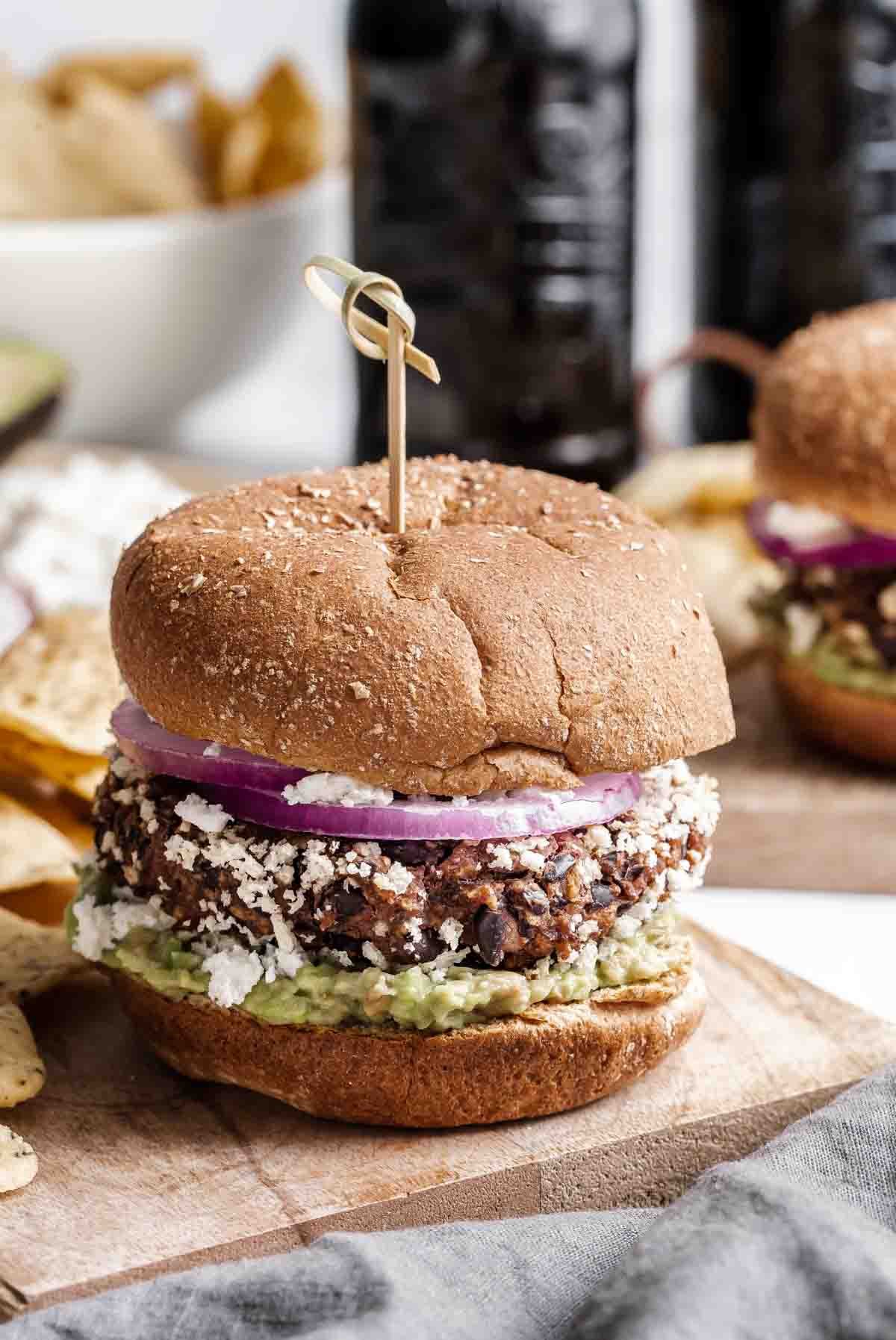 Black bean burger with toothpick on top.