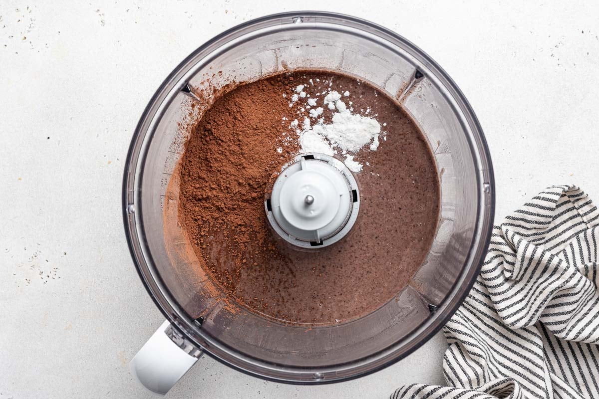 Black beans and cocoa powder in food processor.