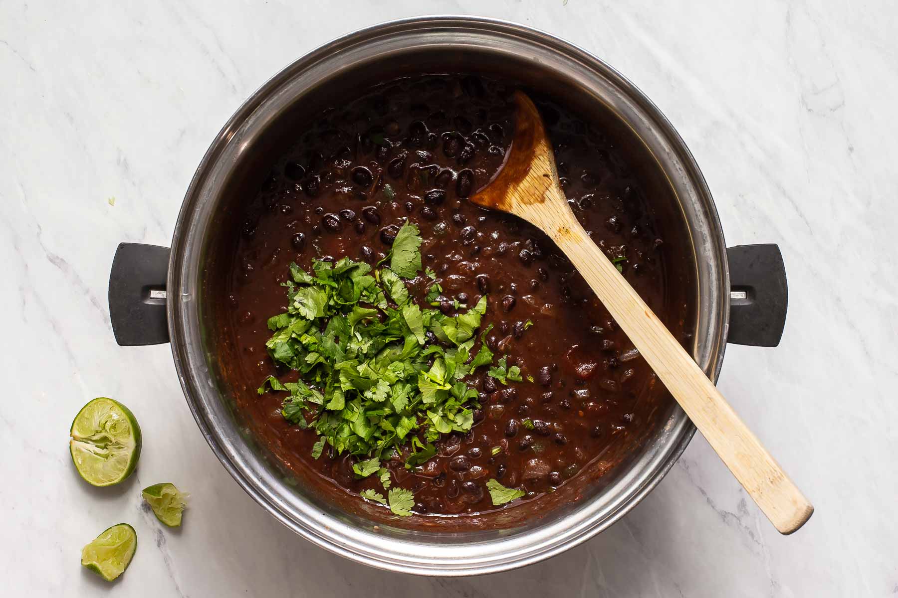 Black bean soup with fresh cilantro piled on top.