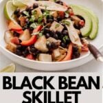 Vertical pin image of black bean skillet recipe.