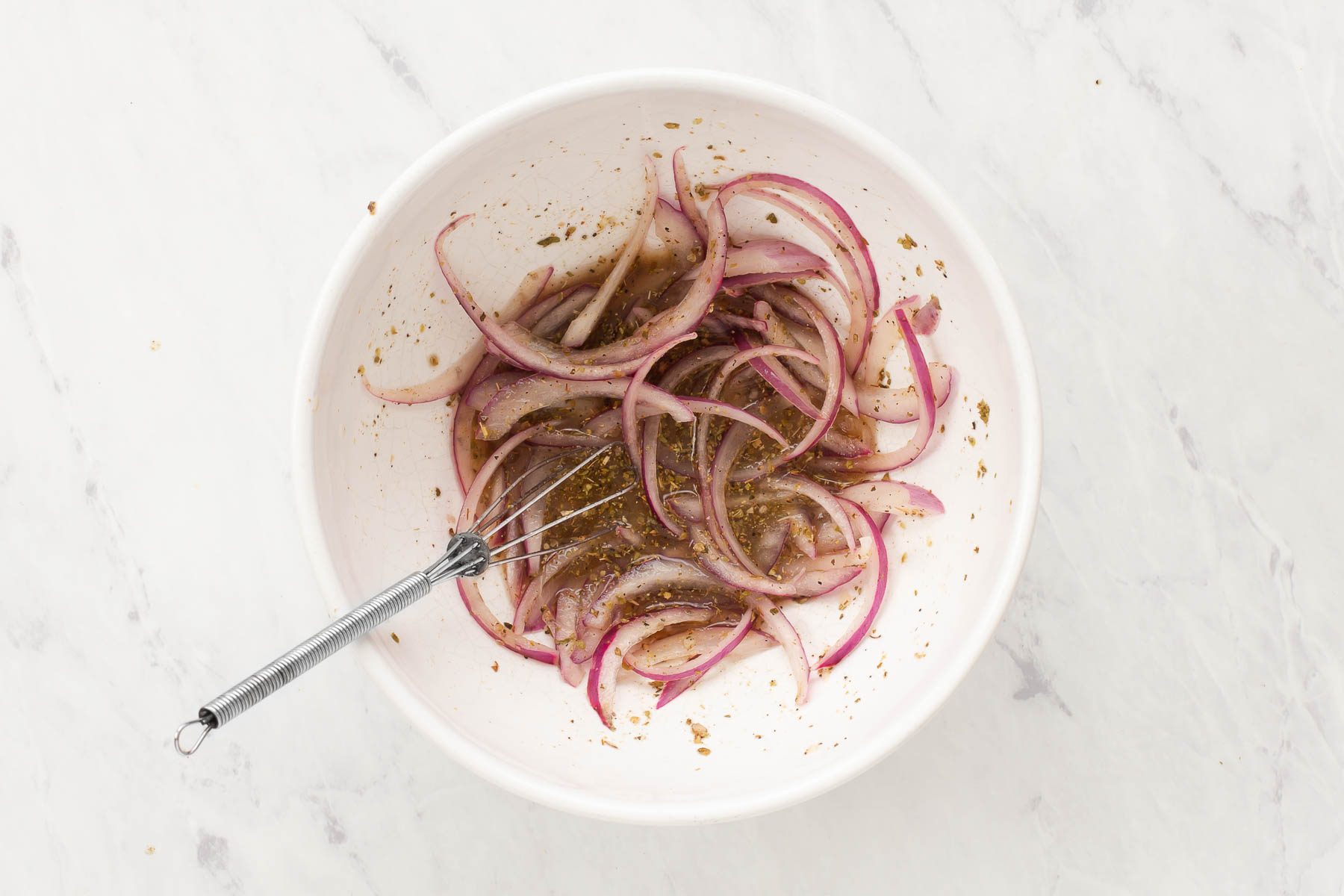 Red onions in marinade.