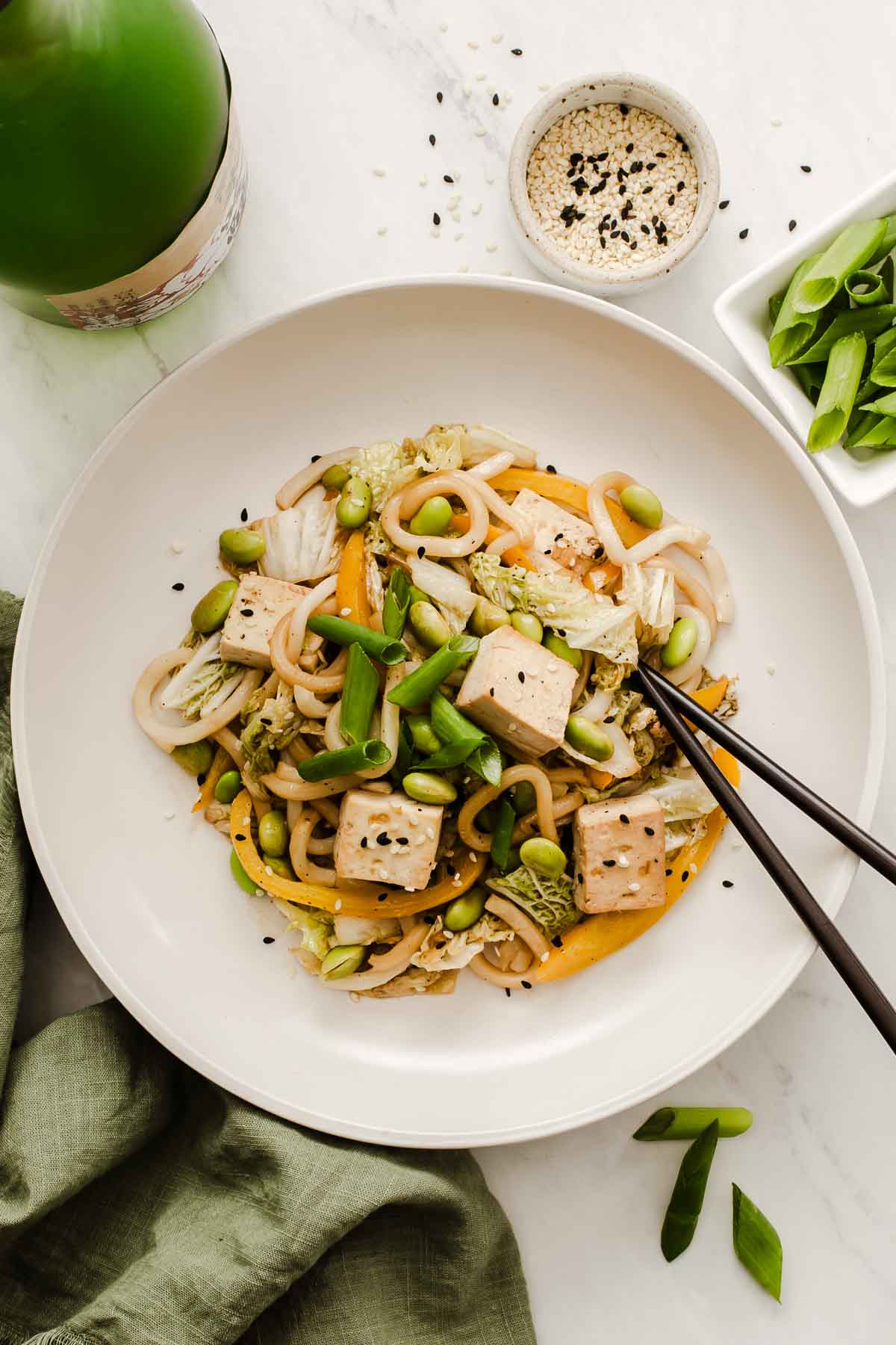 Overhead shot of edamame stir fry with noodles and tofu.